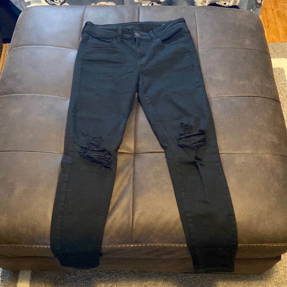 American Eagle Outfitters Black Ripped Next Level Stretch Jegging. Size 4R.